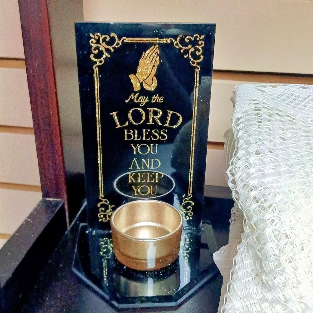 Black & gold candle holder with the words 'May the LORD BLESS YOU AND KEEP YOU'